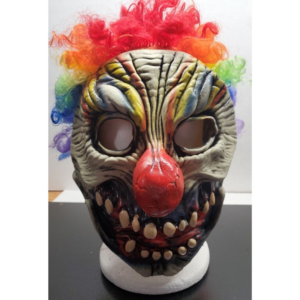 Scary zombie clown with big red nose latex mask and multi-color hair - Halloween